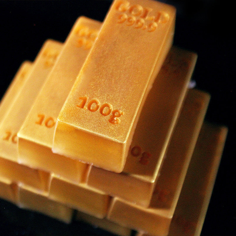 Simulated gold bar low temperature candle