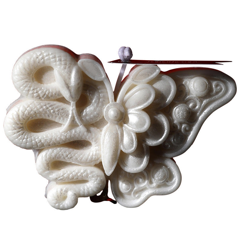 Butterfly snake low temperature candle