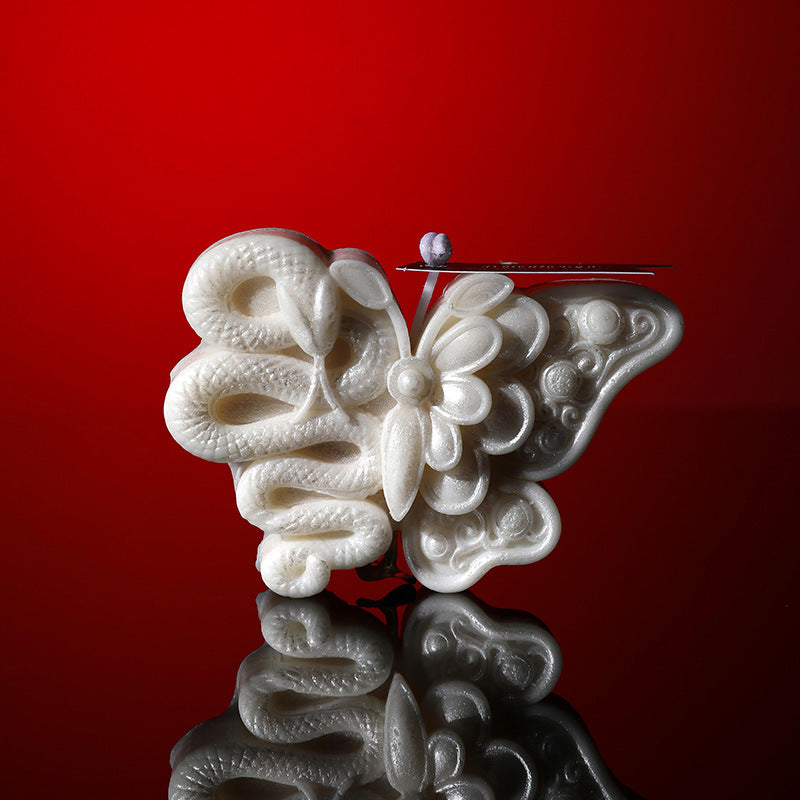 Butterfly snake low temperature candle