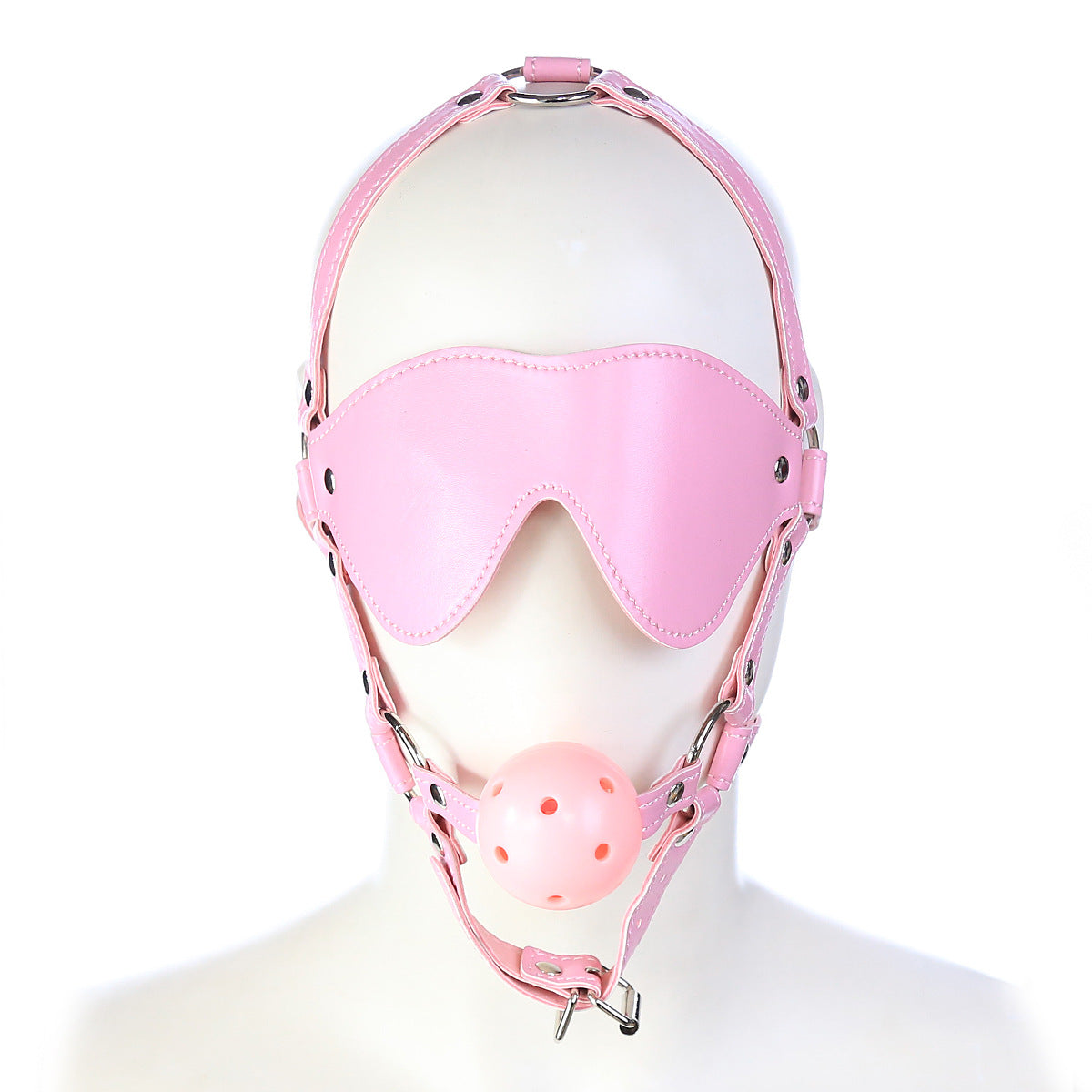 Wearing a hard ball gag with leather blindfold